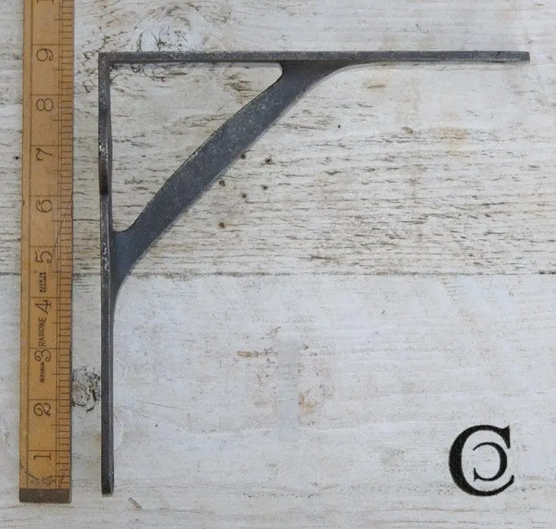 A Pair Of Cast Iron Gallows Brackets