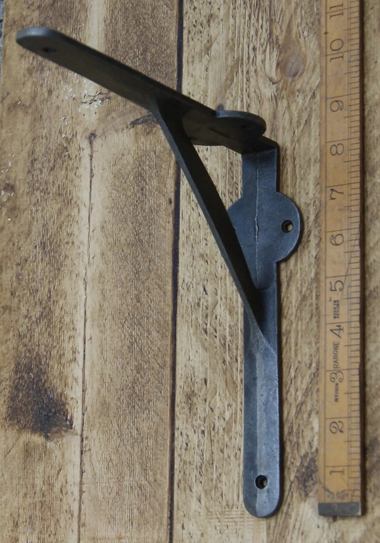 A Pair Of Cast Iron Gallows Brackets