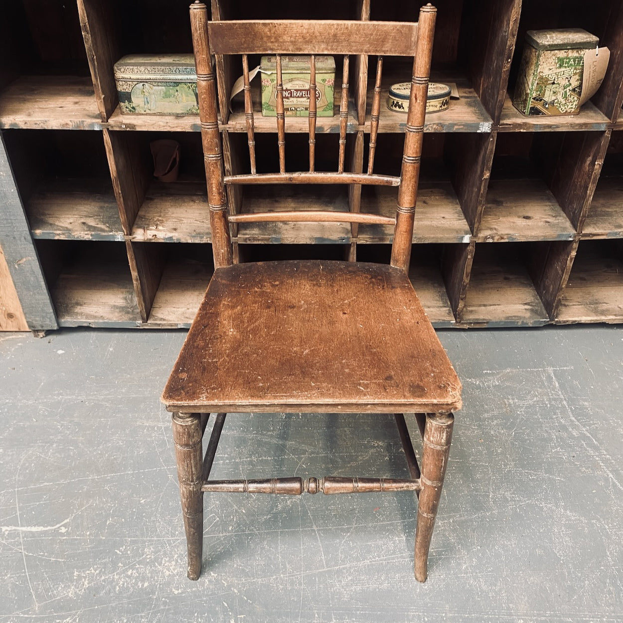 A circa 1880 Spindle Back Chair with Solid Seat