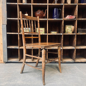 A circa 1880 Spindle Back Chair with Solid Seat